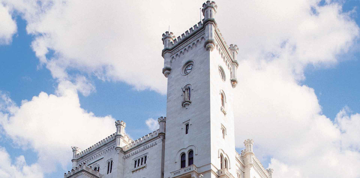 Tower of Miramare Castle against a blue sky