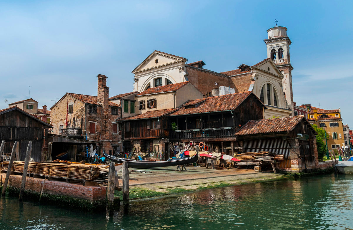 A squero boatyard with a gondola under repair on the slipway