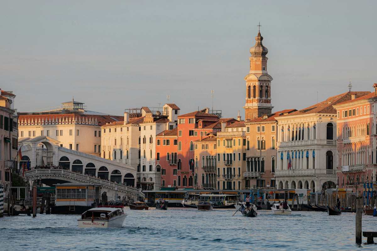 The Grand Canal leading to the Rialto Bridge in warm late-afternoon light