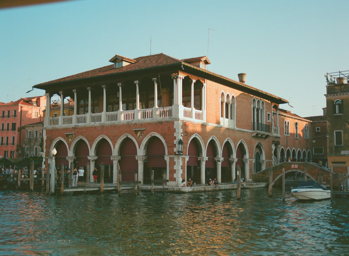 The arcaded Pescheria fish-market hall on the Grand Canal at Rialto