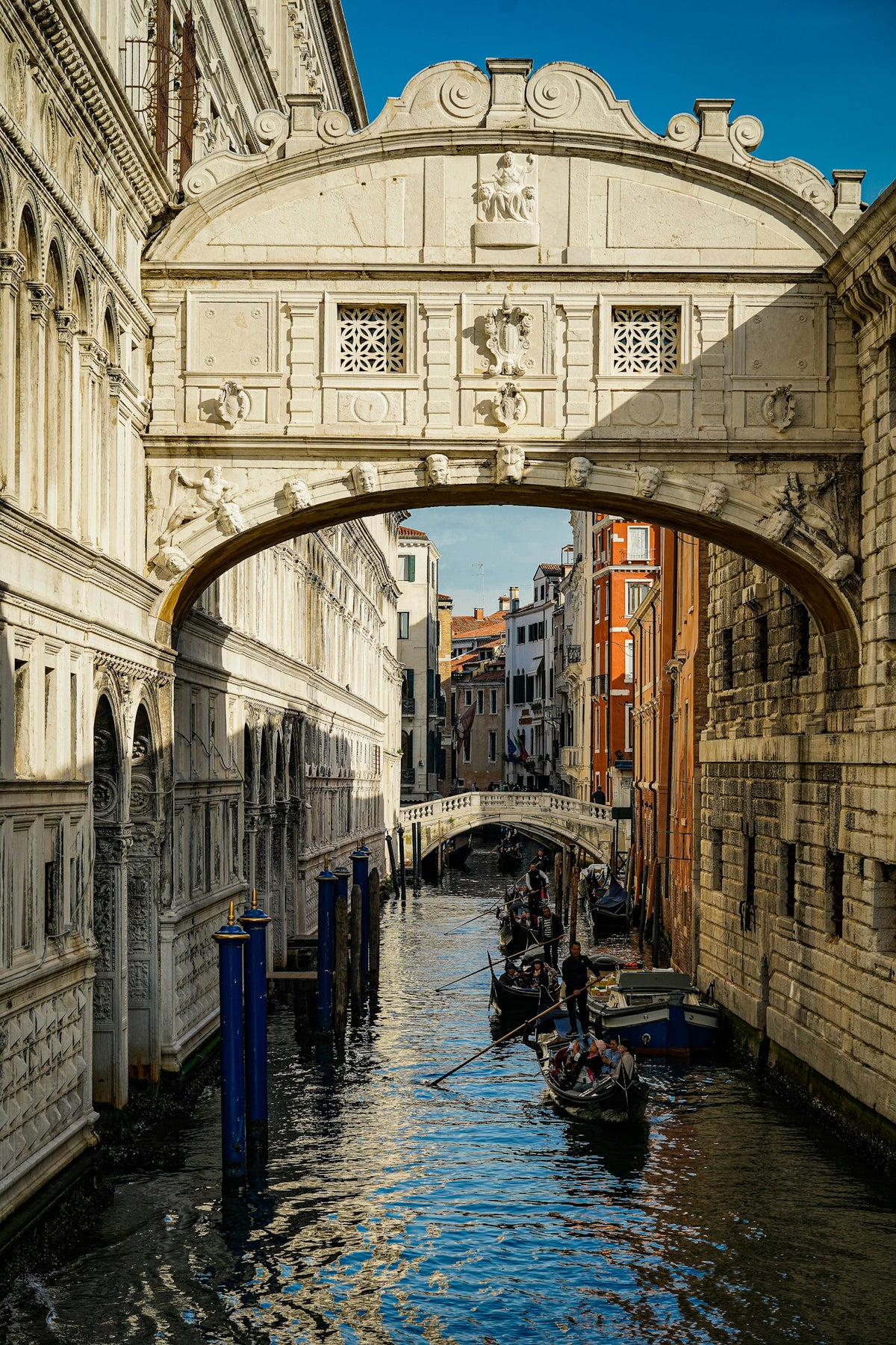 Gondolas passing beneath the Bridge of Sighs