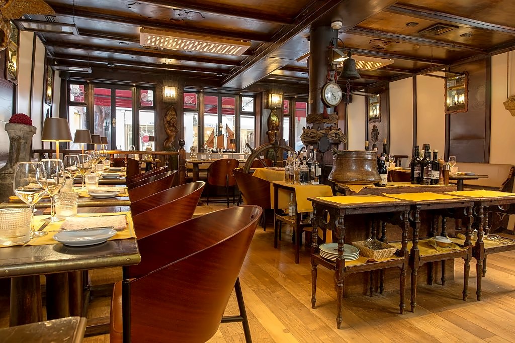 Wood-panelled dining room styled like a ship's interior