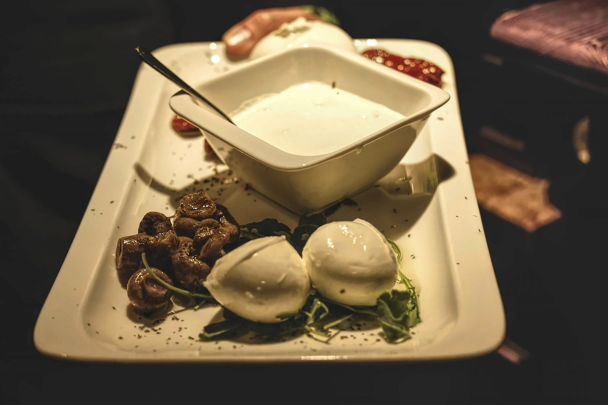 Platter of mozzarella and preserved vegetables at Pane Vino e San Daniele