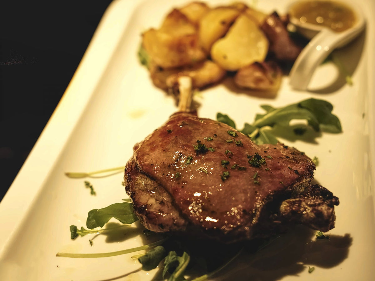 Glazed pork shank with roast potatoes at Pane Vino e San Daniele