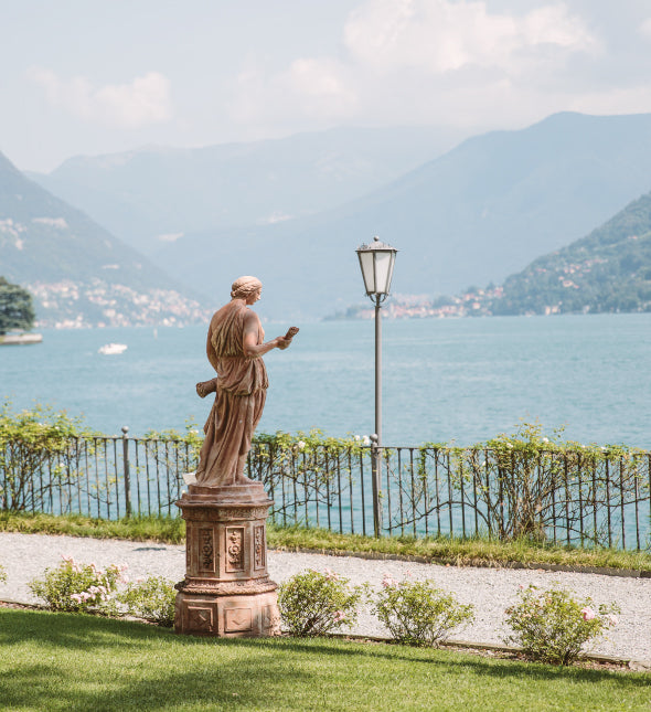 A statue in the garden of Hotel Villa Flori, facing the lake