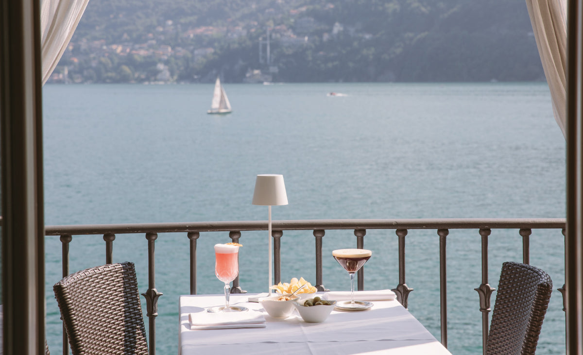 An aperitivo on a balcony over the lake at Hotel Villa Flori